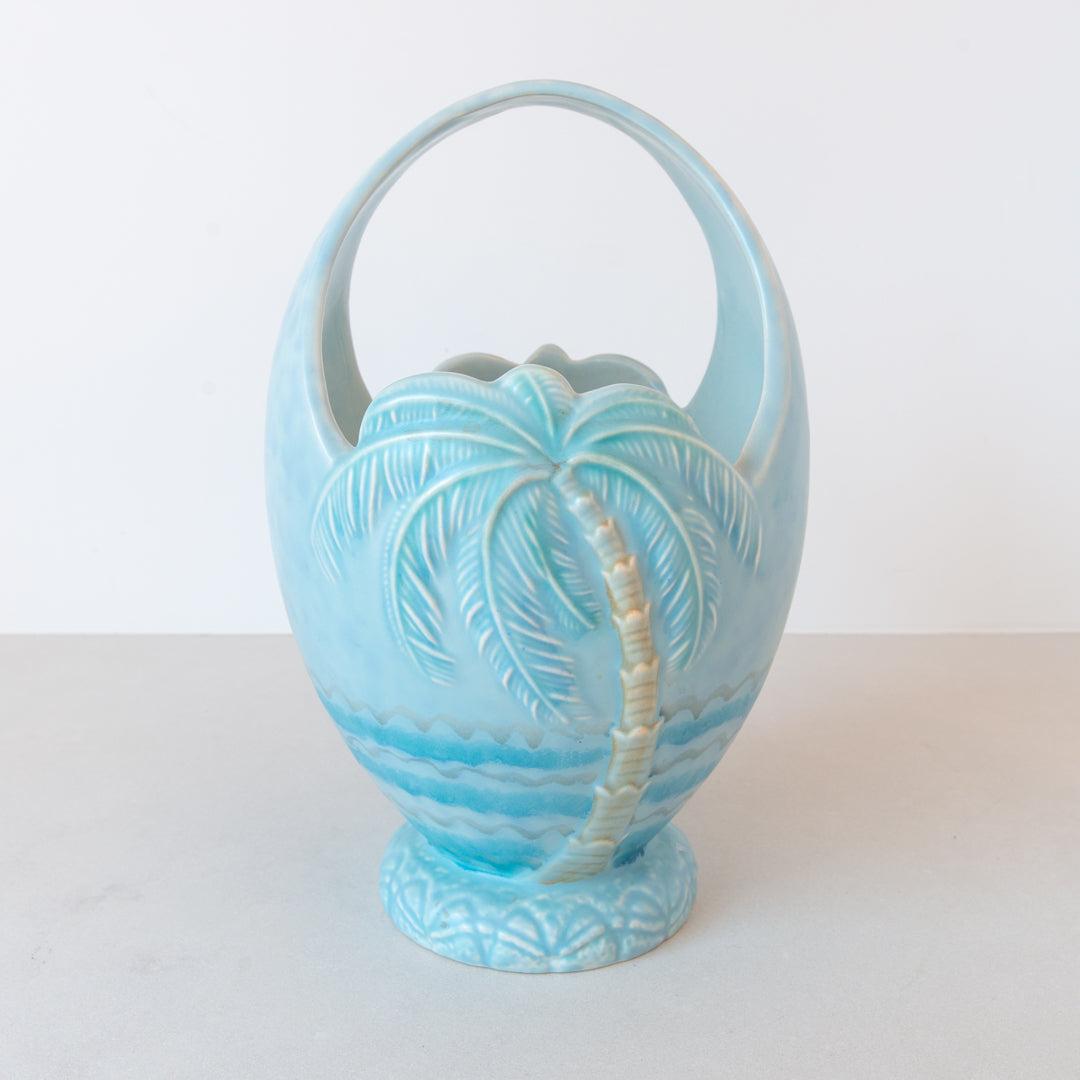A rare and beautiful vintage pale blue art deco Beswick basket vase with moulded palm tree detail at Inner Beach Co, Toronto, Canada