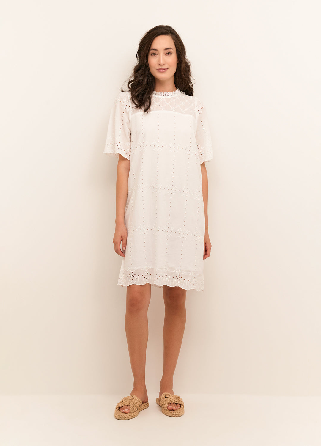 Full view of the Cream Clothing Denmark Moccamia Dress in Snow White cotton with eyelet detailing at Inner Beach Co, Toronto, Ontario, Canada