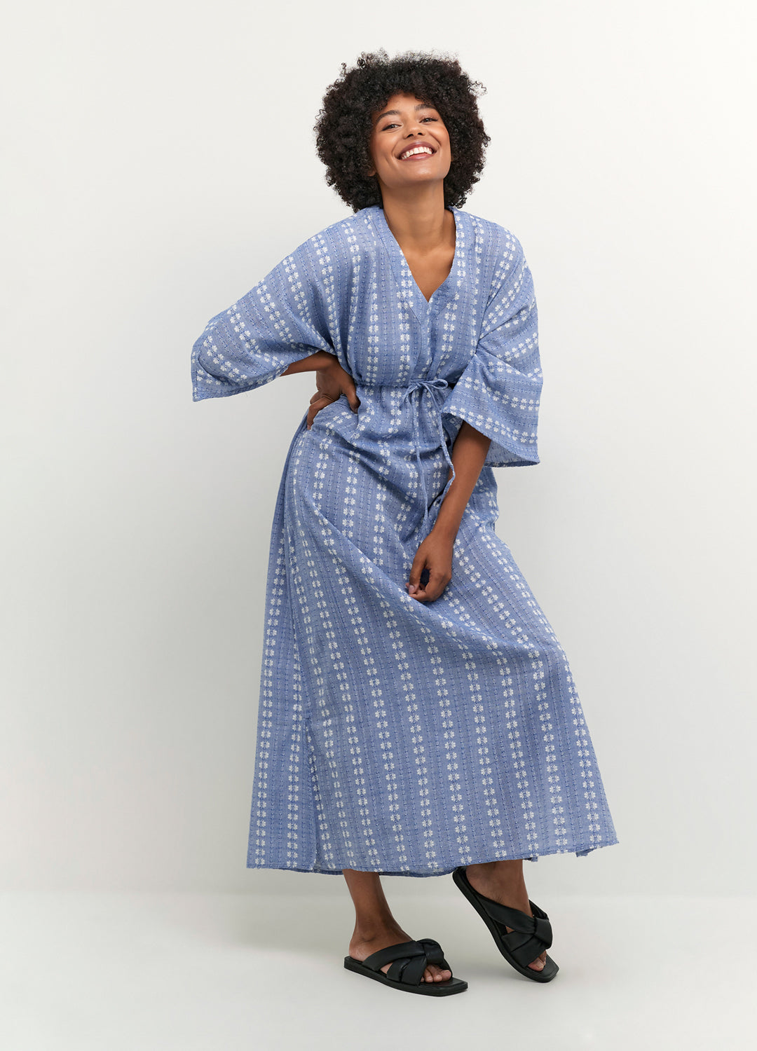 Alternate front view of the Culture Adriette Dress in Ultramarine blue pattern with a loose, flowy silhouette at Inner Beach Co, Toronto, Ontario, Canada