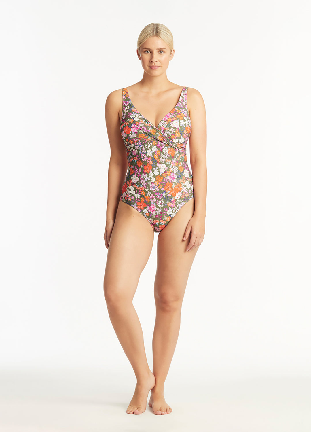 Full body view of the Sea Level Swim Australia 'Parkland' Cross Front One Piece Swimsuit in Khaki floral print at Inner Beach Co, Toronto, Ontario, Canada