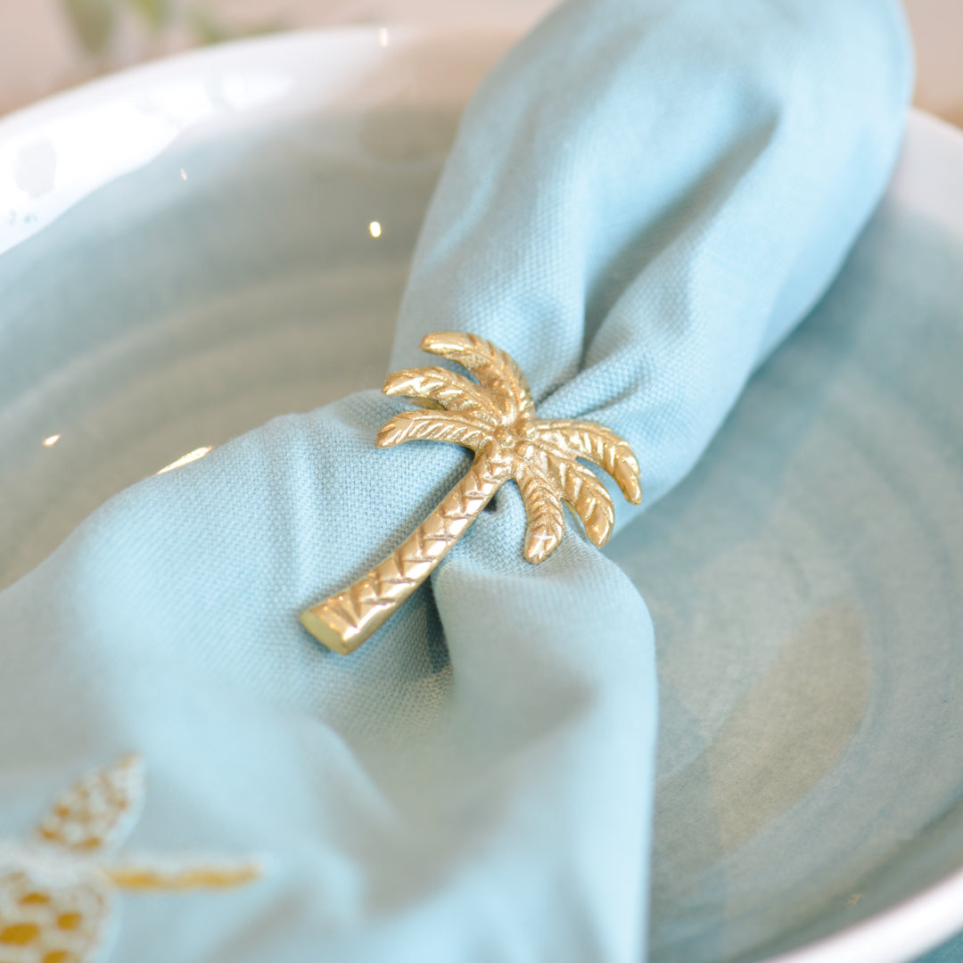 Set of 4 Bronze Palm Tree Napkin Rings made by Balizen in Java available at Inner Beach Co, Toronto, Ontario, Canada 
