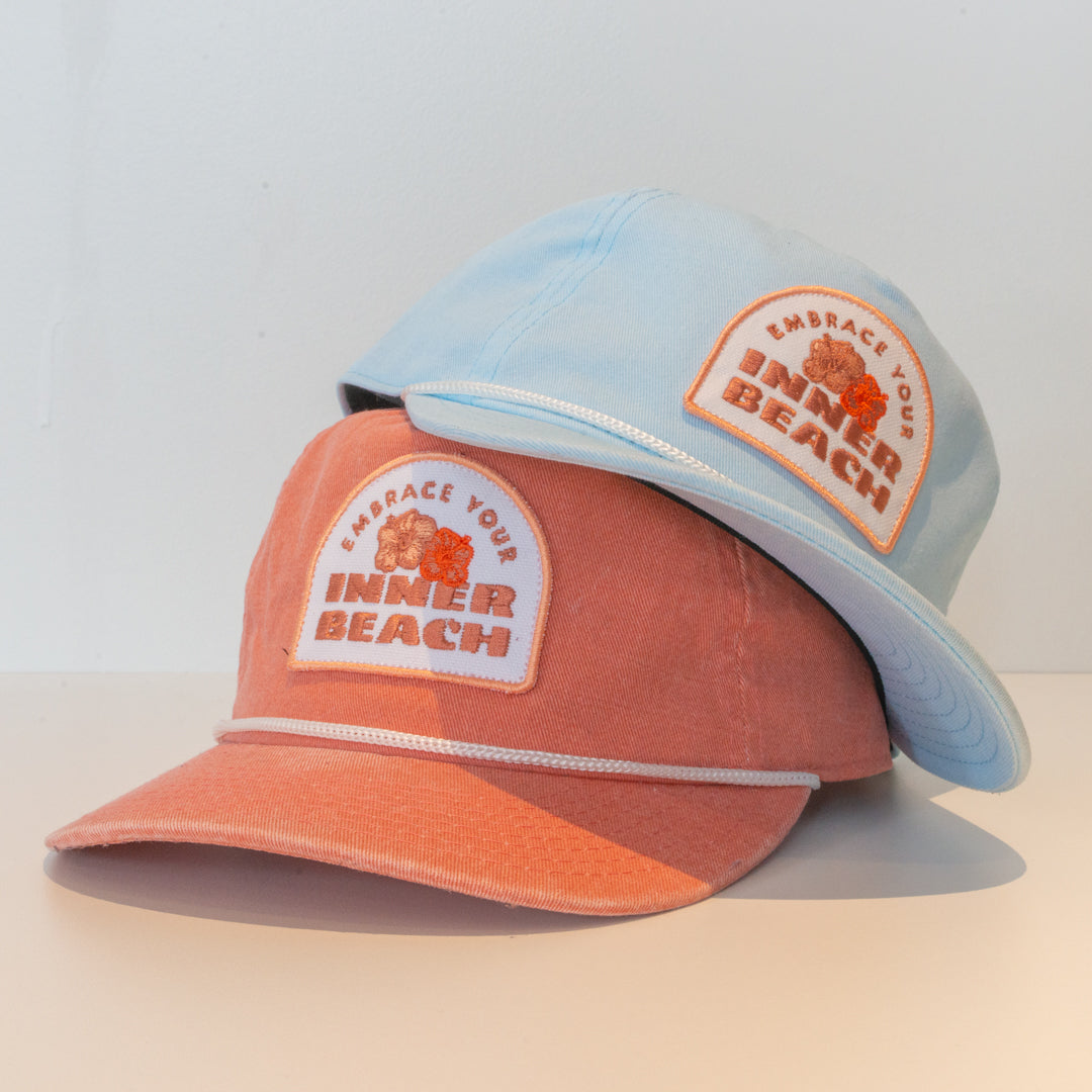 Comfy unstructured 5-panel hat with beautifully embroidered custom Inner Beach design on canvas patch.