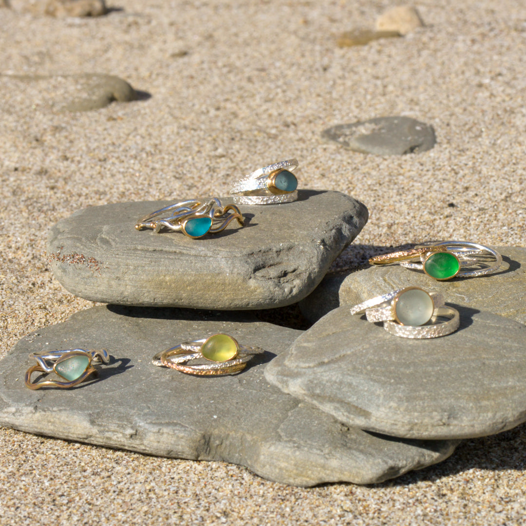 Collection of Kate Samson Lake Ontario Beach Glass Rings in various colours at Inner Beach Co, Toronto, Ontario, Canada