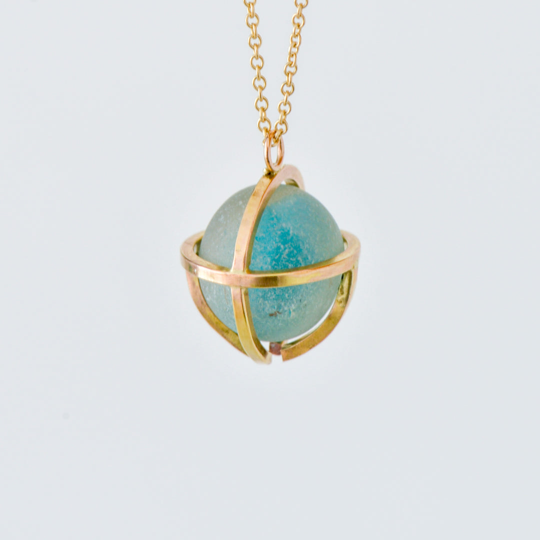 Kate Samson Gold and Lake Ontario Beach Glass Marble Caged Pendant Necklace in Aqua at Inner Beach Co, Toronto, Ontario, Canada