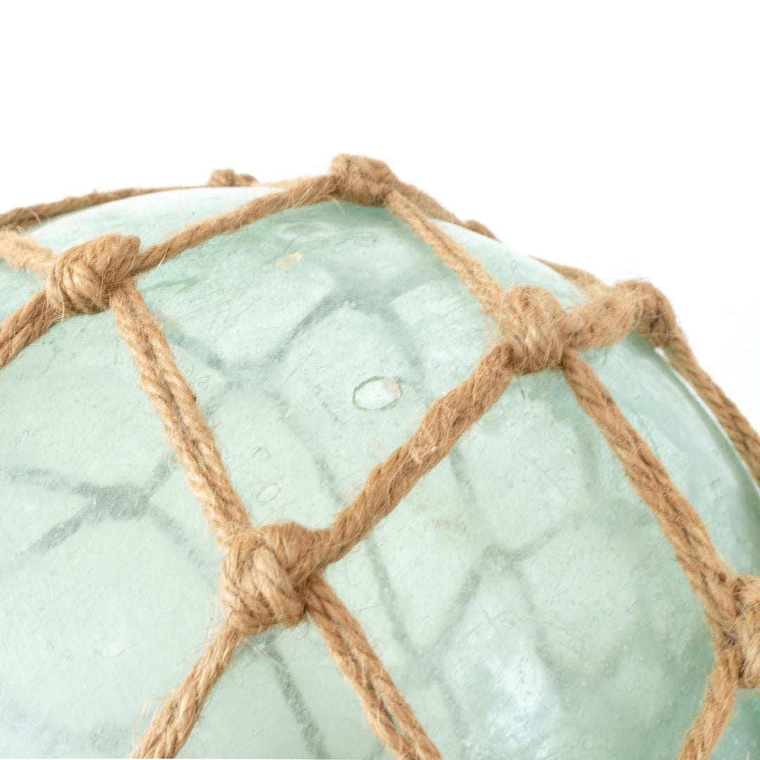 Authentic Japanese large hand-blown glass fishing float with burlap netting at Inner Beach Co, Toronto, Canada