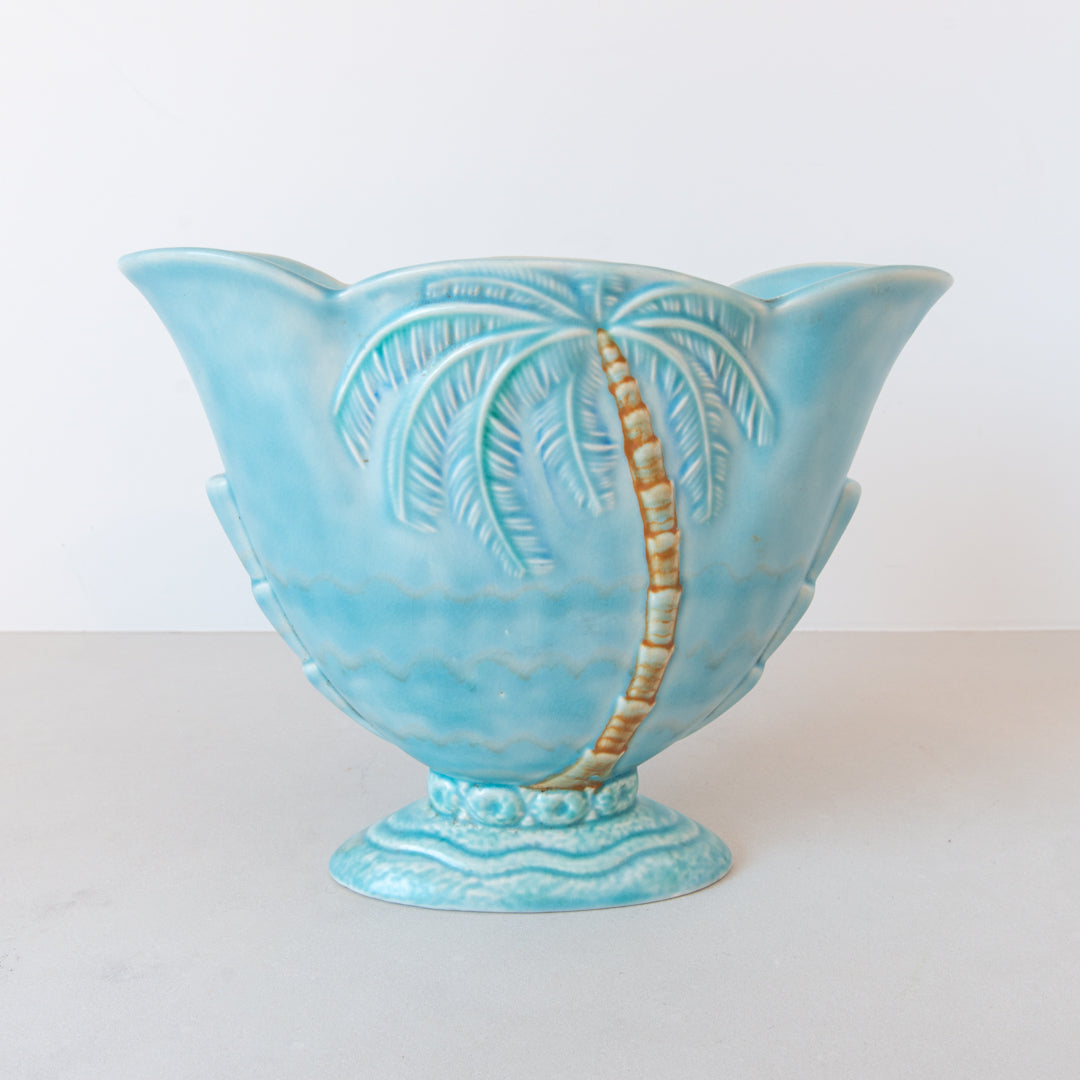 A rare and beautiful pale blue art deco Beswick wide vase with moulded palm tree detail at Inner Beach Co, Toronto, Canada