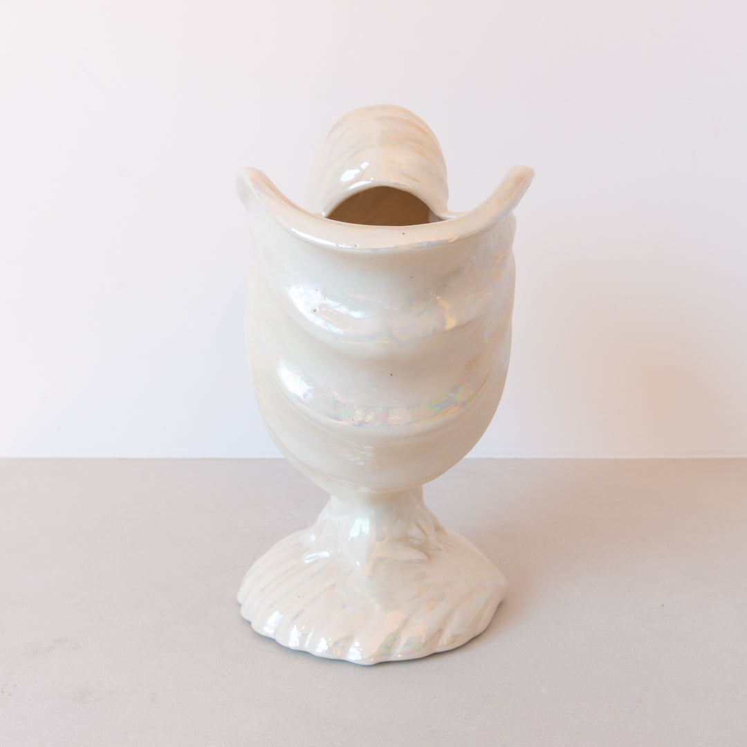 Vintage large ceramic nautilus shell cachepot planter finished in iridescent cream at Inner Beach Co, Toronto, Canada