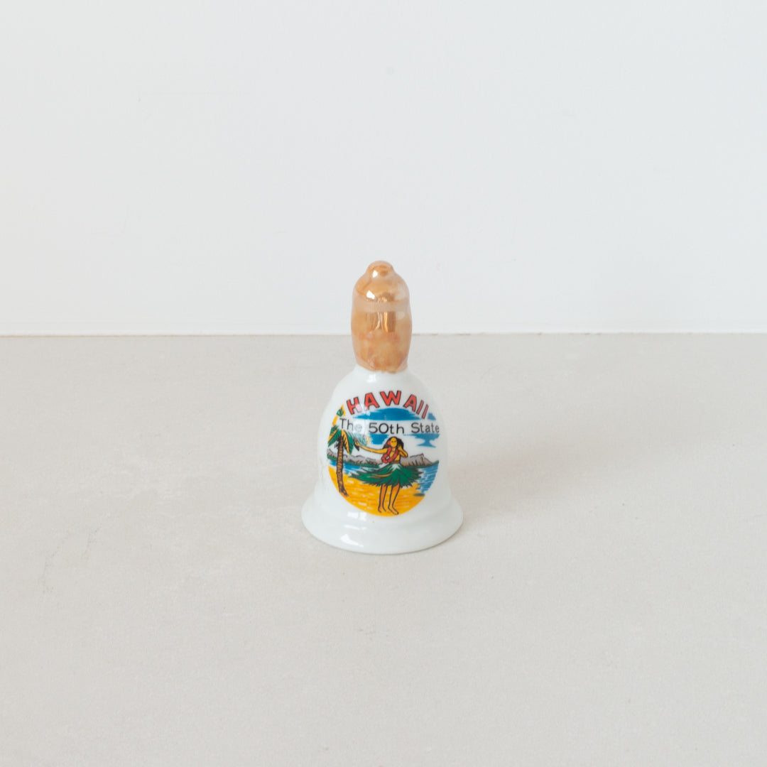 Vintage ceramic 'Hawaii The 50th State' souvenir bell at Inner Beach Co, Toronto, Canada
