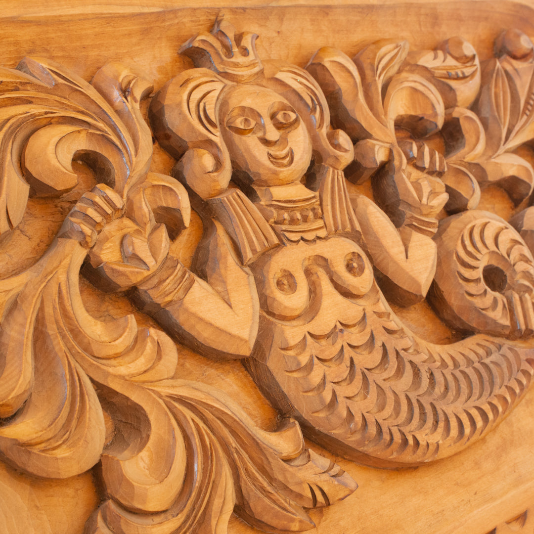 Vintage large hand-carved wood mermaid relief panel at Inner Beach Co, Toronto, Canada