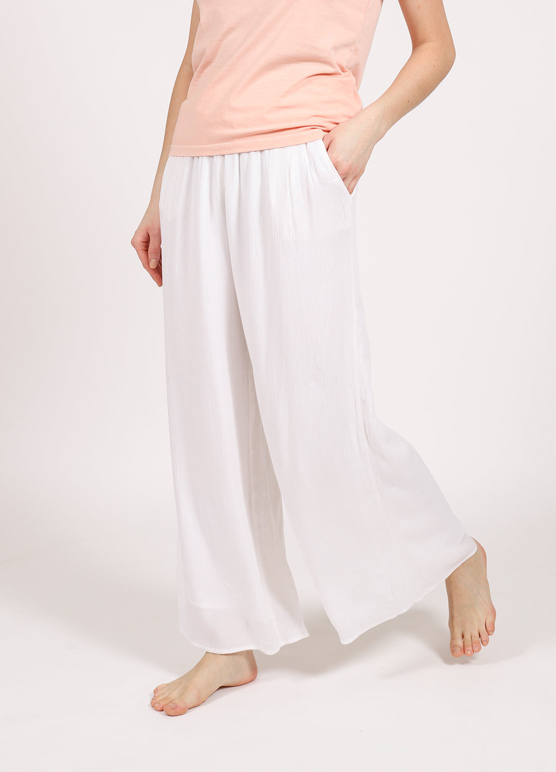 Koy Resort Miami Pant classic wide leg pant in soft crinkle rayon with an easy elastic ruched waistband in white at Inner Beach Co, Toronto, Canada
